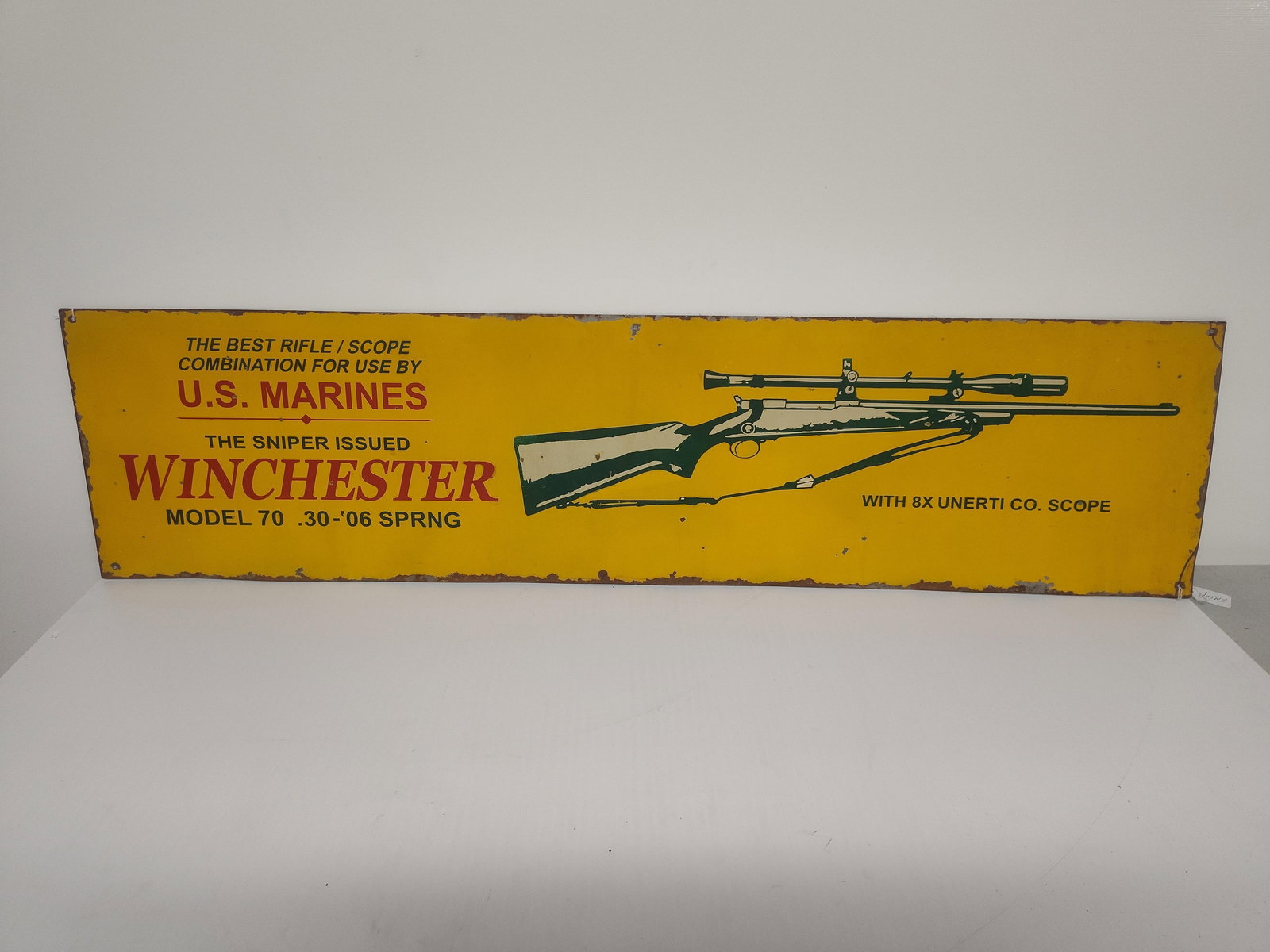 Winchester US Marines Tin Sign: Some paint chipping along edges. Great scope, rifle advertising piece. Newer sign. 47.5x 12