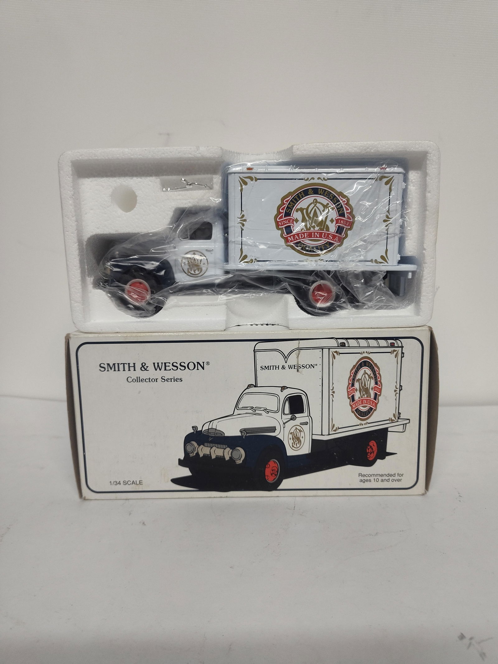 FIRST GEAR 1951 FORD DRY GOODS VAN SMITH AND WESSON COLLECTOR SERIES TRUCK (1 of 2)