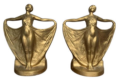 Pair Art Deco Cast Iron Gowned Beauty Bookends, Gilded Figural Doorstops: 16 Pound combined weight, warm gilded hue, factory numerals on the rear, 9 3/8" tall x 8" x 4 1/2".