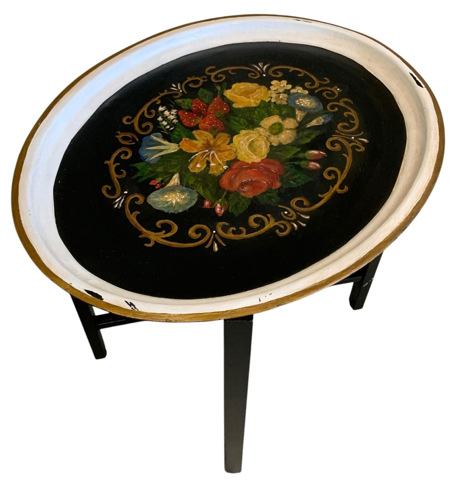 19th Century French Tole Painted Tea Tray Table with Folding Wood Stand: Early Metal tray with hand painted floral detailing and raised lip, 20 1/4" x 16 1/2" x 1 1/4" with folding painted black wood leg stand (18 1/2" x 18" x 13 1/2"), some age to the painted metal, old p