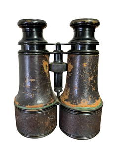 19th Century Lemaire Fabt Parisian Optical Brass & Leather Binoculars: 6" in length, 4 3/4" across the lenses, clear image, age and wear to the leather covering the brass.