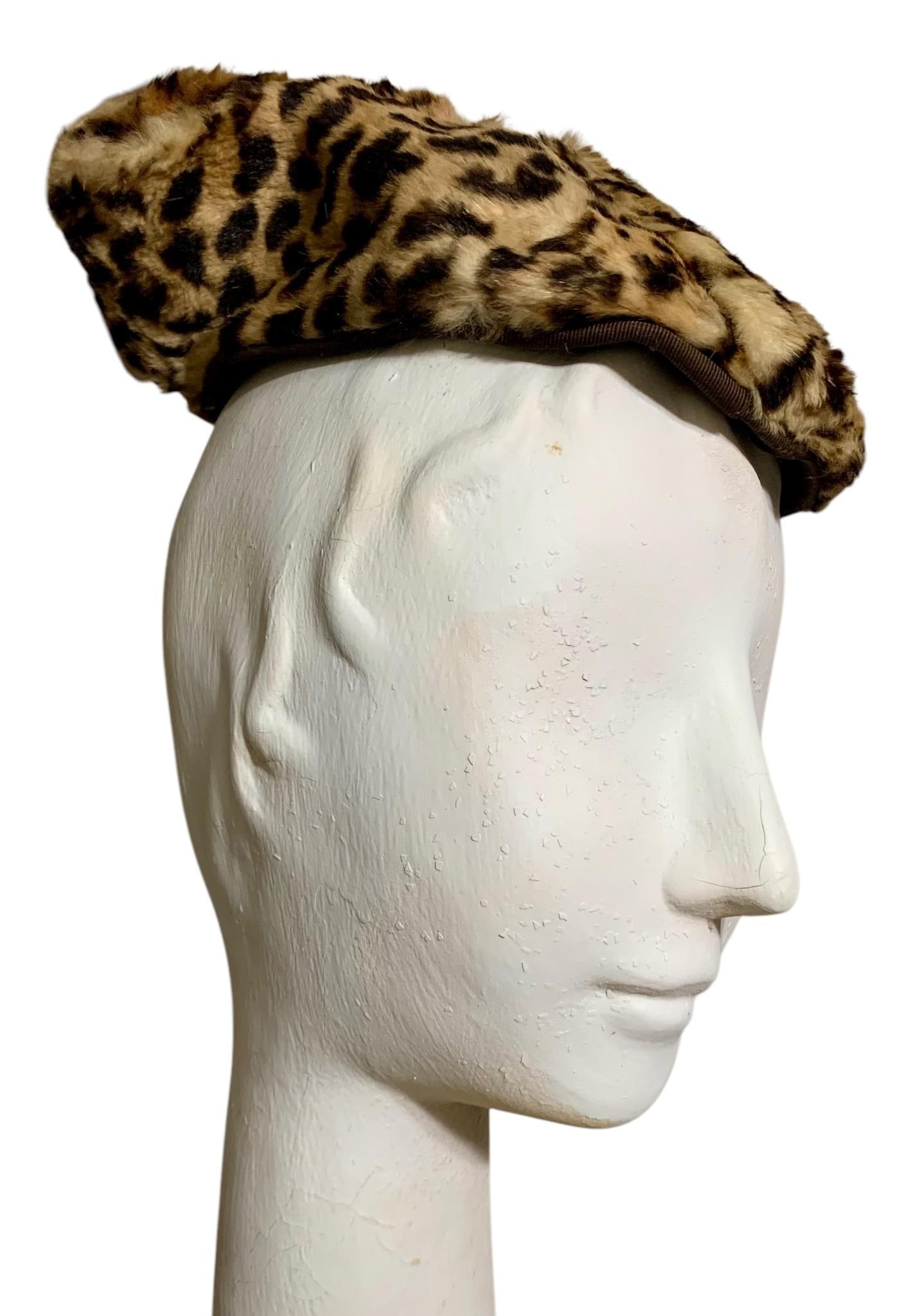 1940s Big Cat Fur Asymmetrical Triangular Toque Hat with 2 Mid Century Hatboxes: Some wear to the nap, no millinery label, 7 12" x 7" x 3", scattered darkening to the plaid 12" and 14" nesting paperboard hatboxes.