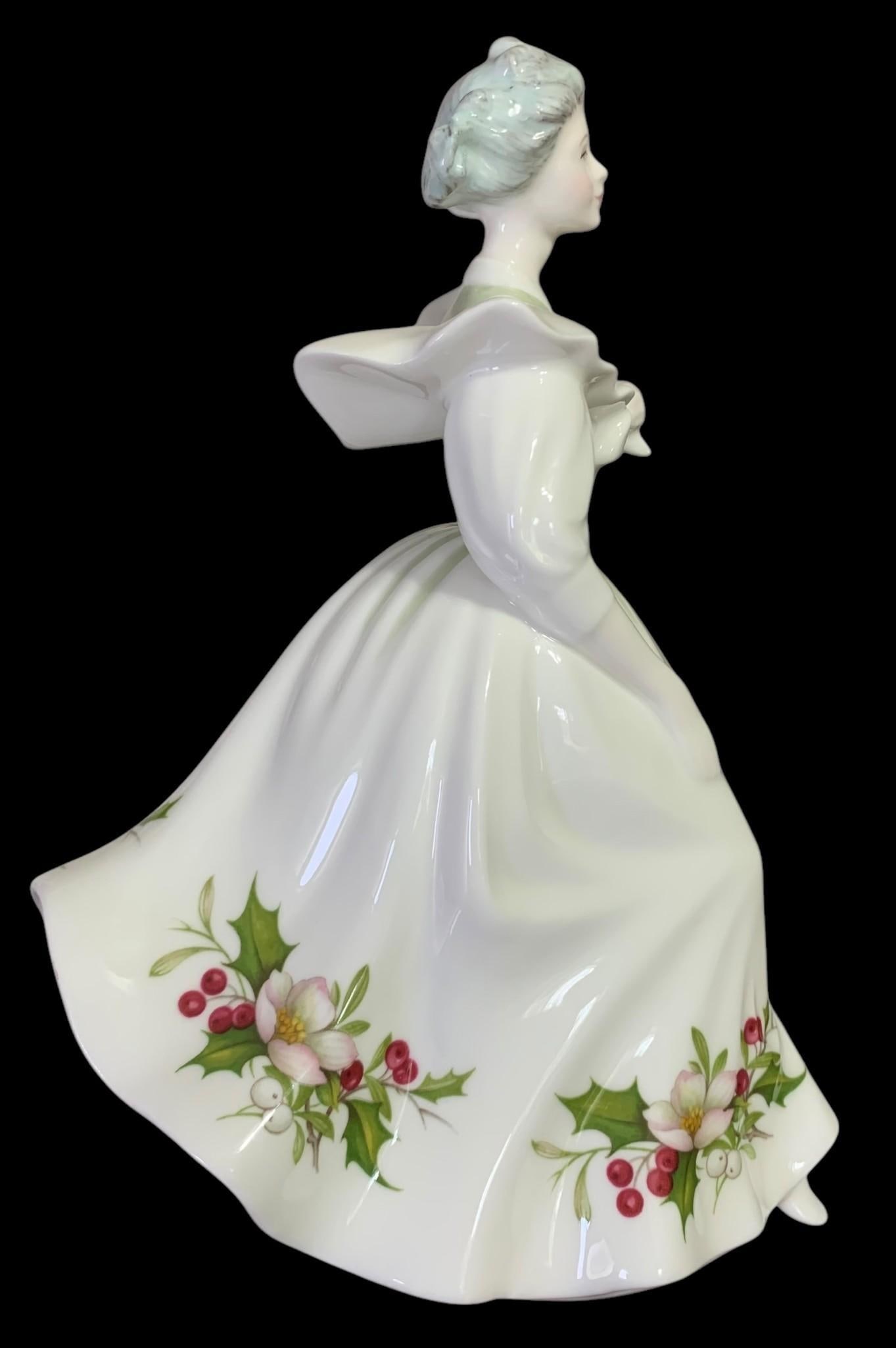 1987 Royal Doulton December Beauty Figure of the Month Porcelain Statue: 8 3/8" x 6 1/2", no structural issues, beautifully crafted.