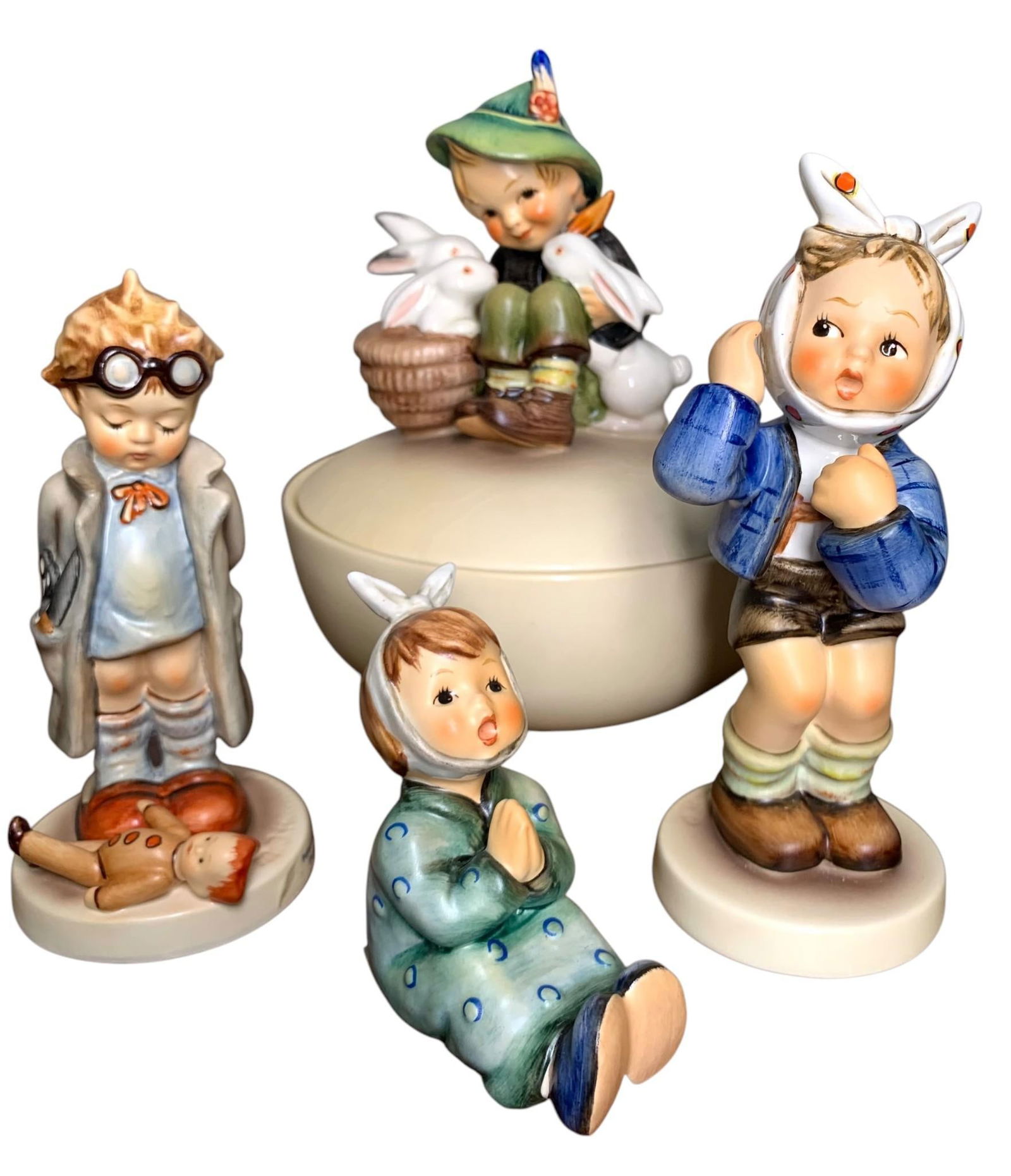 4 West Germany & Germany Goebel Figurines: #58 Candy Dish, #127, #217 & #533: Delightful collection that includes: early "Playmates" bunny lidded candy dish with small imperfection under the rear brim of his hat, #127 Doctor, 1951 #217 Boy with Toothache, 1988 #533 Scamp, No bo