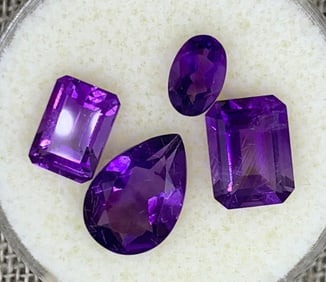 19 pc Jewelers Faceted Unmounted Gemstone Collection: Garnet, Amethyst, Topaz