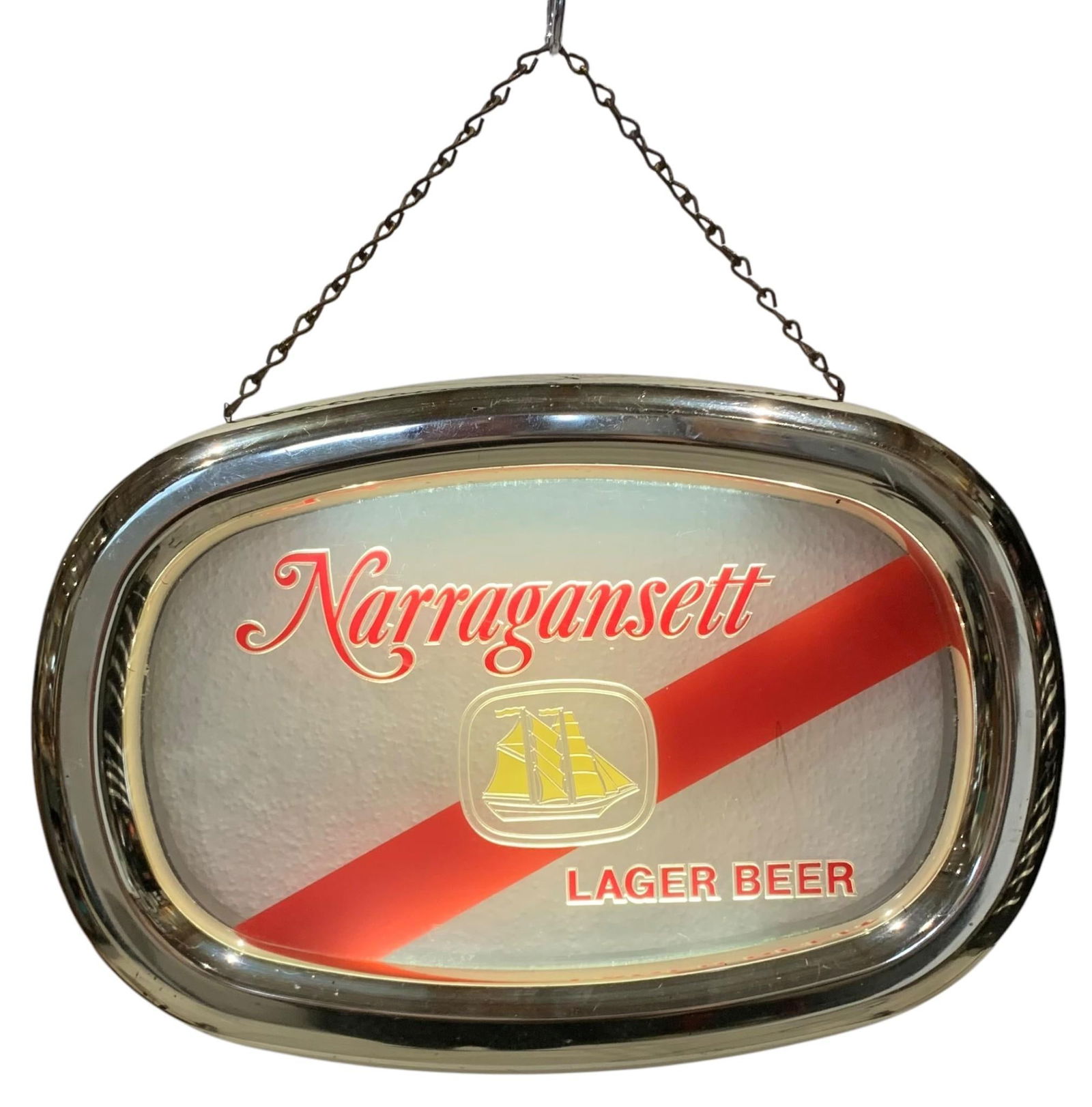 Working Vintage Narragansett Lager Beer Illuminated Bar Advertising Light: 20 1/2" x 14" with 6" drop for the hefty hanging chain, golden composite framing with a few hairlines on the right side and top center as shown, illuminates when plugged in.