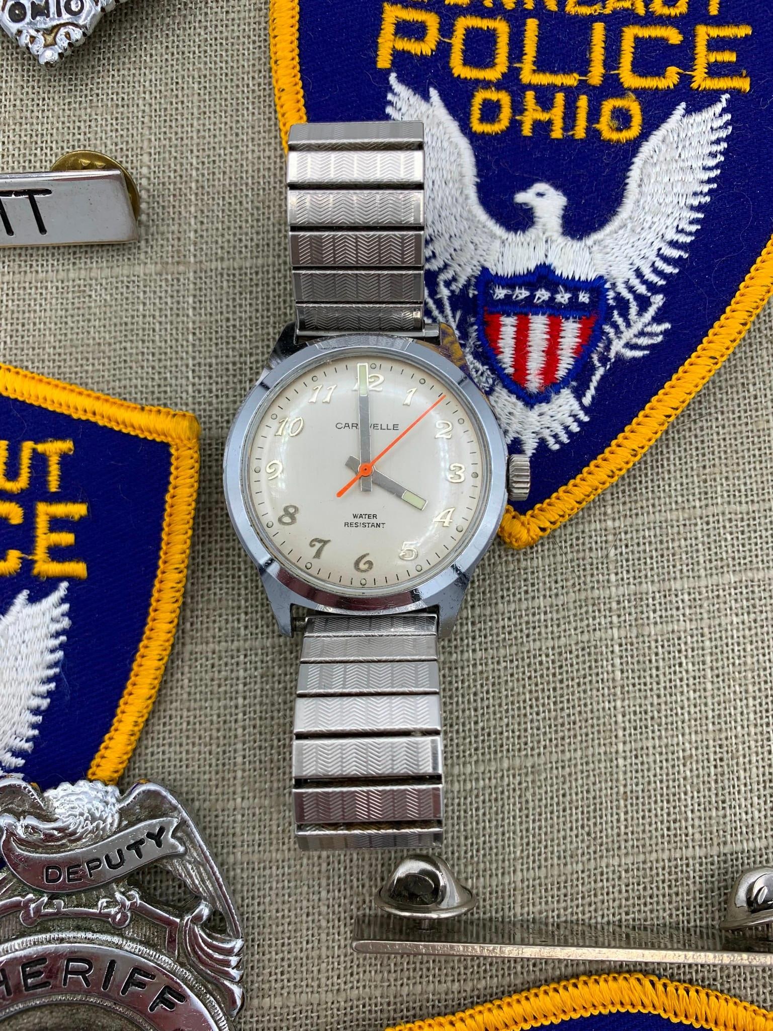 Leo Sackett's State of Ohio Sheriff, Police Department, & Watch Collection: From the estate of US Marine Veteran & Retired Sheriff Leo D Sackett: including his badges, pins, patches, his working Mid Century Caravelle wind up wristwatch and his Pulsar quartz (in need of a fres