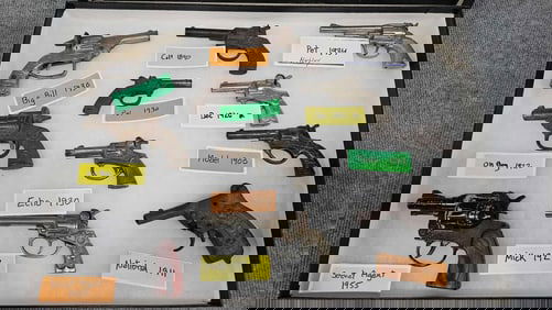 Collection of 11 early cap guns