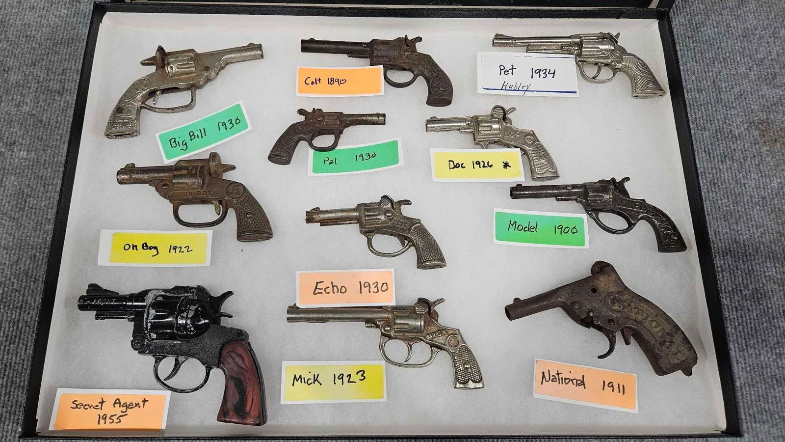 Collection of 11 early cap guns (1 of 7)