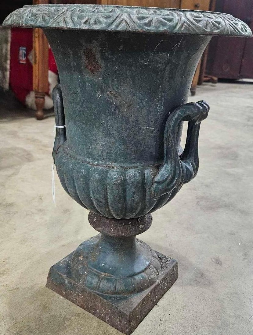 Ornate cast iron 17" Urn: Top is 12in diameter 17in tall.