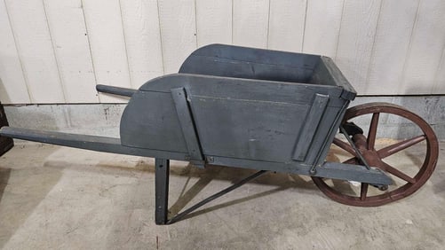 Primitive painted wheelbarrow