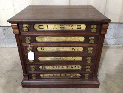 Clark's Country Store 6-drw Spool Cabinet: Early oak cabinet with original ONT brass pulls, reverse painted scripts show some wear and top has a chip on upper left corner, otherwise is pretty nice! 24.5in wide 19in deep 22in tall.