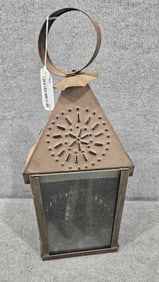 Early punched tin hurricane lantern