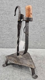 Early hand forged iron adjustable candle holder