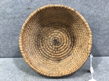 Hand woven straw bowl