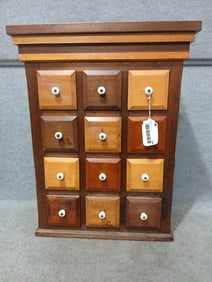 Great mixed wood 12 drw Apothecary cabinet