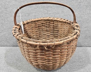 Early woven handled basket