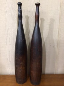 Pair of early Primitive Indian Clubs