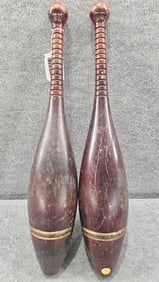 Pair of early Primitive Indian Clubs