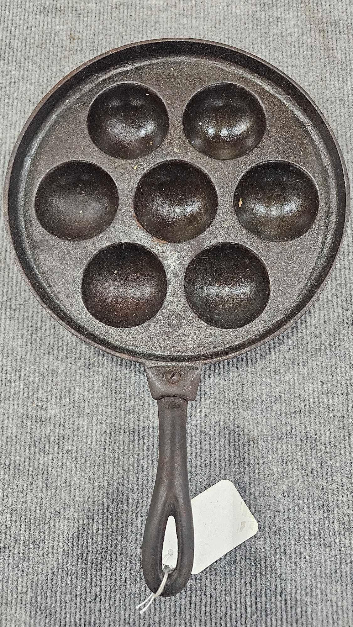 Cast Iron Egg Poacher: Unmarked piece in good condition.