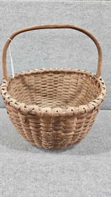 Early woven handled basket