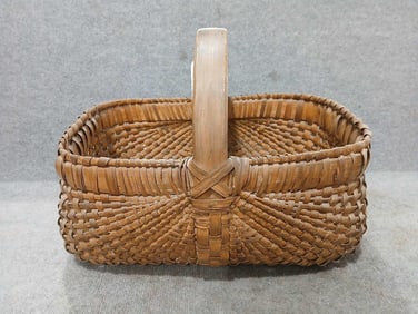 Primitive woven basket