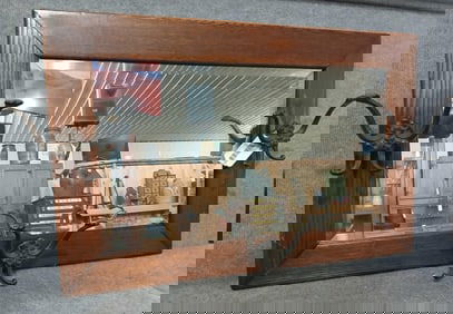 Beveled mirror in oak frame with 3 ornate hooks