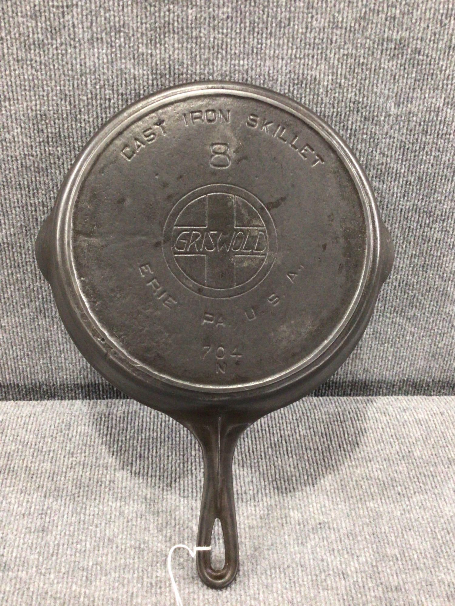 Griswold #8 cast iron skillet: Slant logo. Shows some user wear but overall is clean.