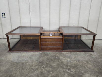 Early Oak Country Candy Store Showcase w/register drwr: Great early unusual piece with showcase on each side, center storage council with hinged Lift Top lid, missing lock mechanism. Also has a register drawer with coin tray, with 4 finger mechanism to ope