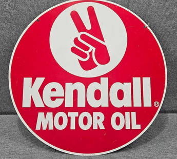 DST Kendall Motor Oil sign: 2-sided painted metal sign with minor scuffing and a small dent in side, otherwise is nice and clean! Marked Scioto Signs 1987. 23in diameter.
