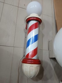Theo Koch porcelain barber pole with globe