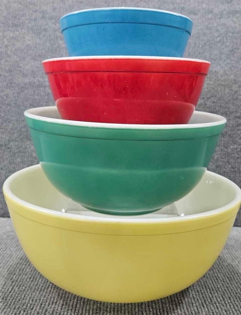 Pyrex Primary Colors 4pc mixing bowl set: Red and blue bowl show some user wear overall is a nice set.