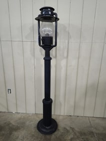 C.T. Ham Mfg Co No.9 kerosene street light on wood pole