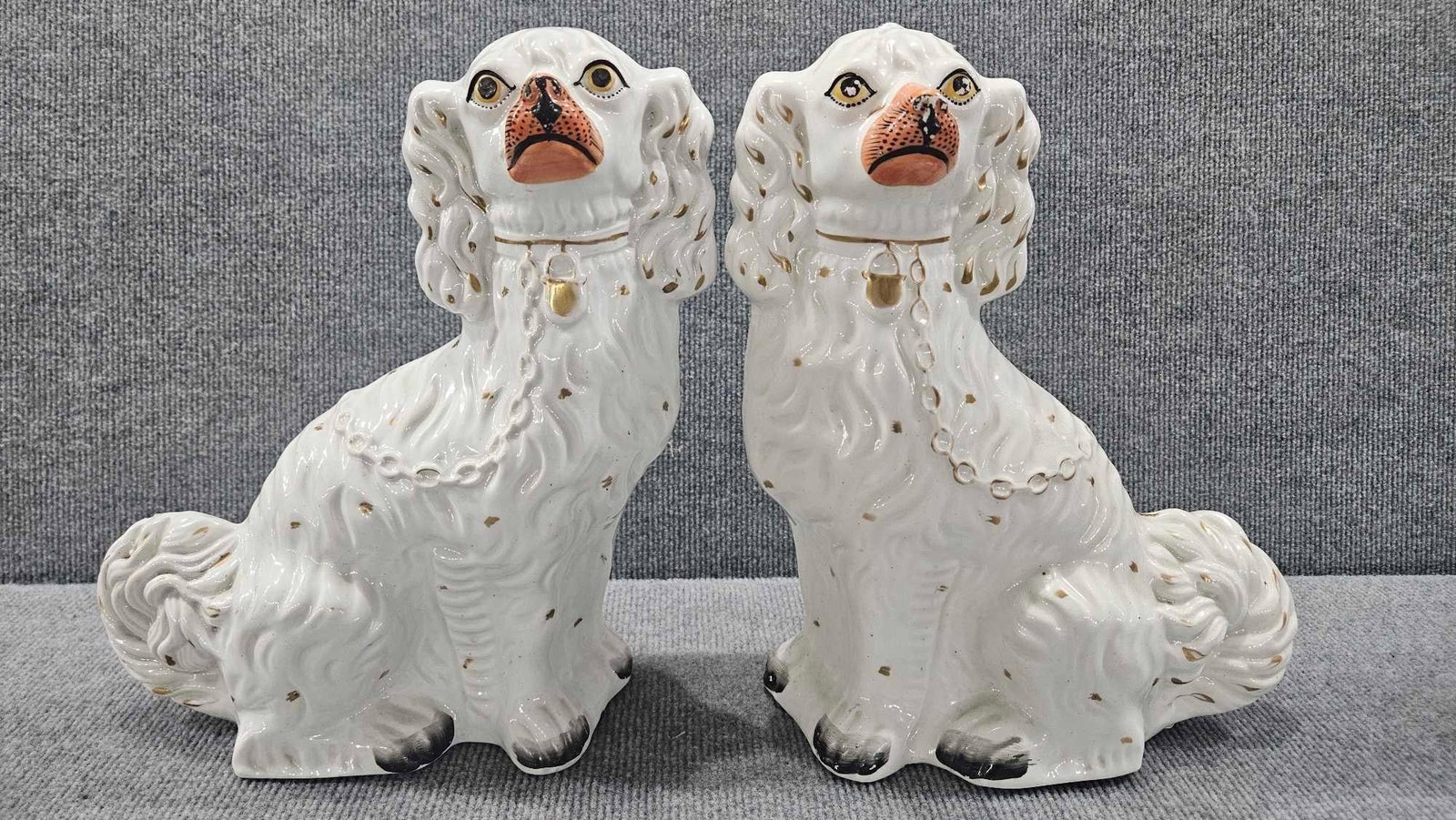 Pair of Staffordshire dogs: Great Right and left facing pair!! Left facing shows some age crackling in Finish but both are in Nice condition! Both are identical and 12.5in tall.