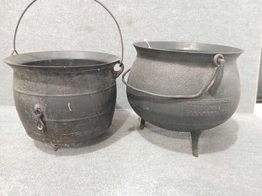 2- Early footed cast iron pots