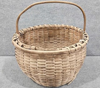 Early woven handled basket