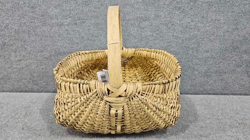Primitive painted handled basket