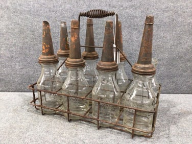 8- Jay B. Rhodes oil bottles with carrier
