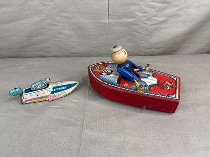 Fisher Price & Tin Litho Boats: Tin Friction River Streak boat is in working condition. Some fading, 5 inches. Fisher price rowing man