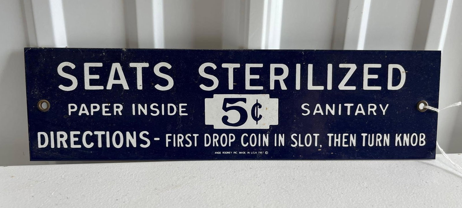 Seats Sterilized Porcelain Sign: Single sided. By the Andy Rooney Inc. 1987. 12x3