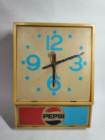 JUNIOR NEW DIMENSION PEPSI LIGHTED WALL HANGING CLOCK