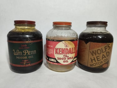 Penn, Kendall, and Wolfs Head Glass Oil Bottles