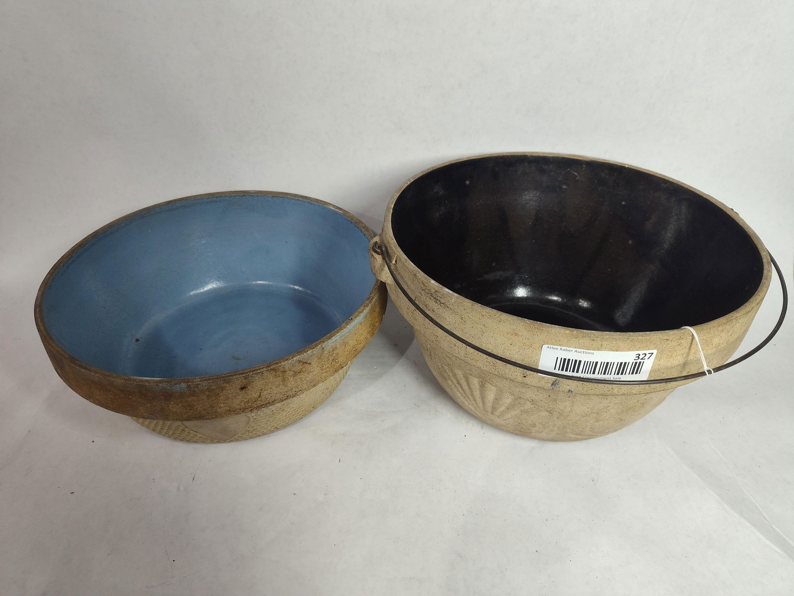 Pair of Stoneware Crock Bowls: Both in good condition, may have a minor hairline or flake.
