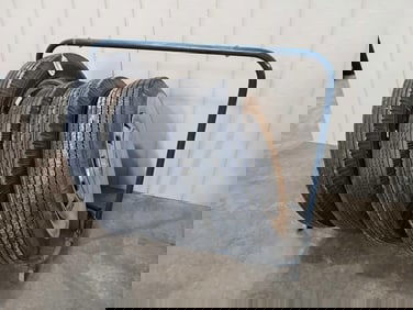 Wood Spoked Wheel, White Wall Tires, Thunderbird Wheel, & Tire Rack