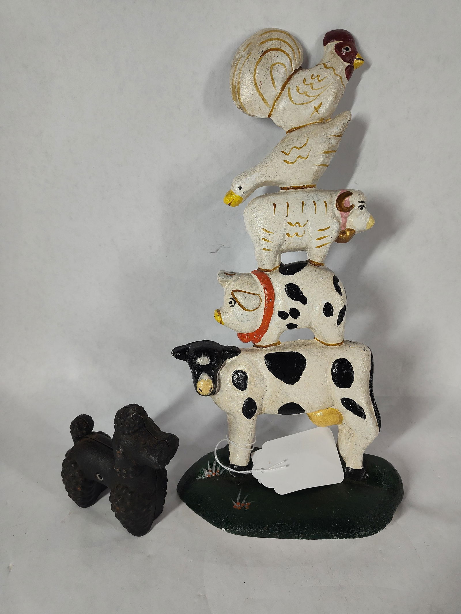 Cast Iron Farmhouse Doorstop & Poodle: Farmhouse stop is 14 inches tall, poodle is 3x4