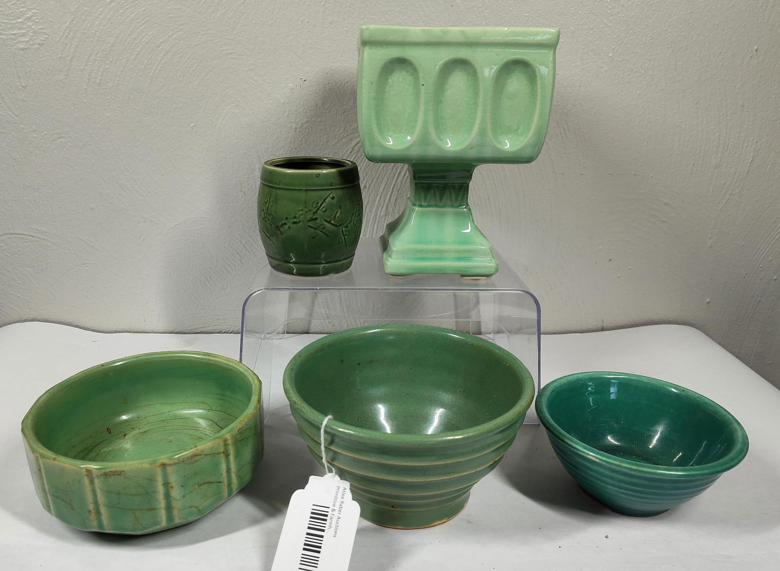 Mint Green Planters & Stoneware Bowls: Several hairline cracks in a few pieces.