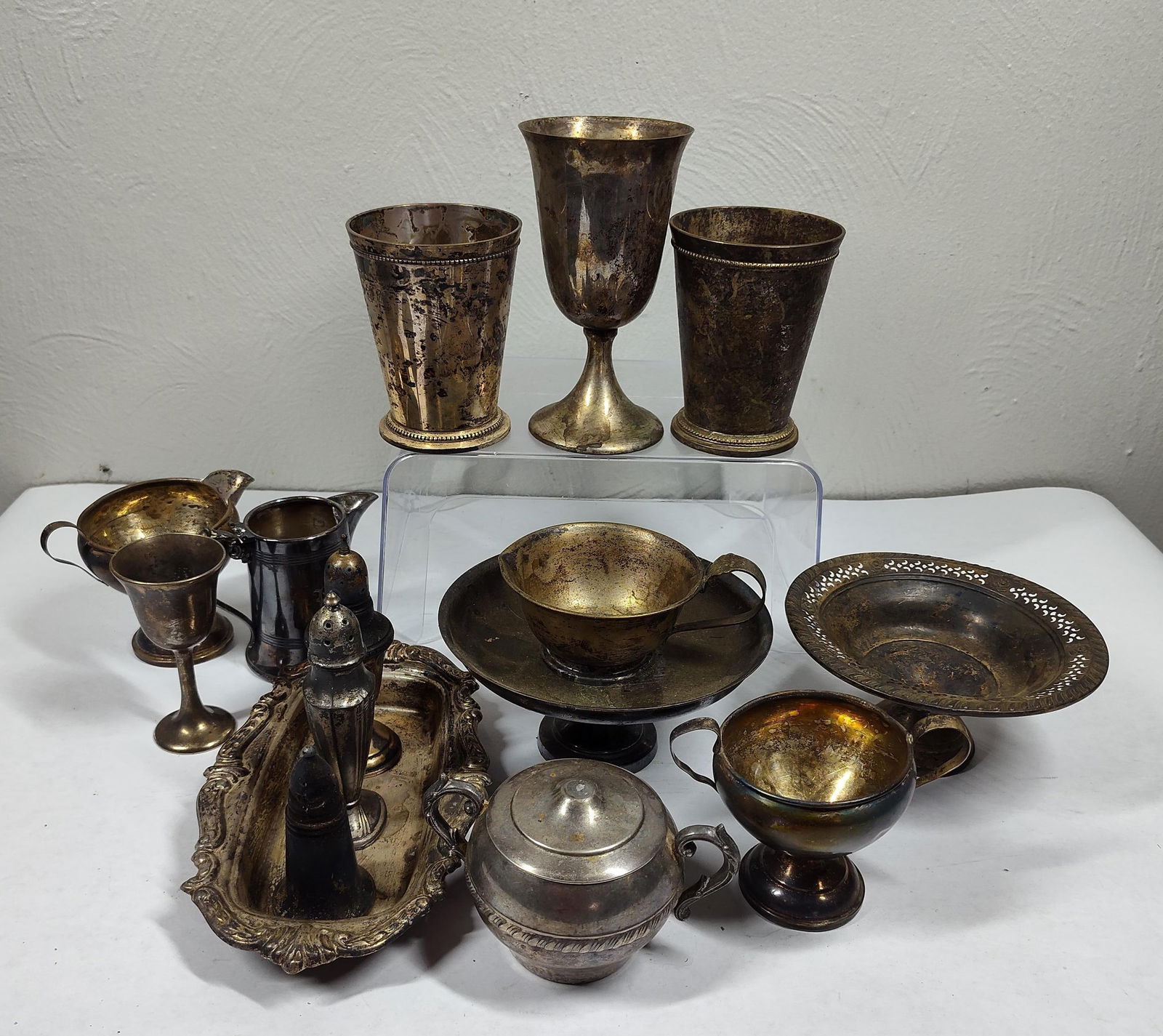 Silver Plated Cups, Shakers, and Compotes: Tarnishing shows to all.