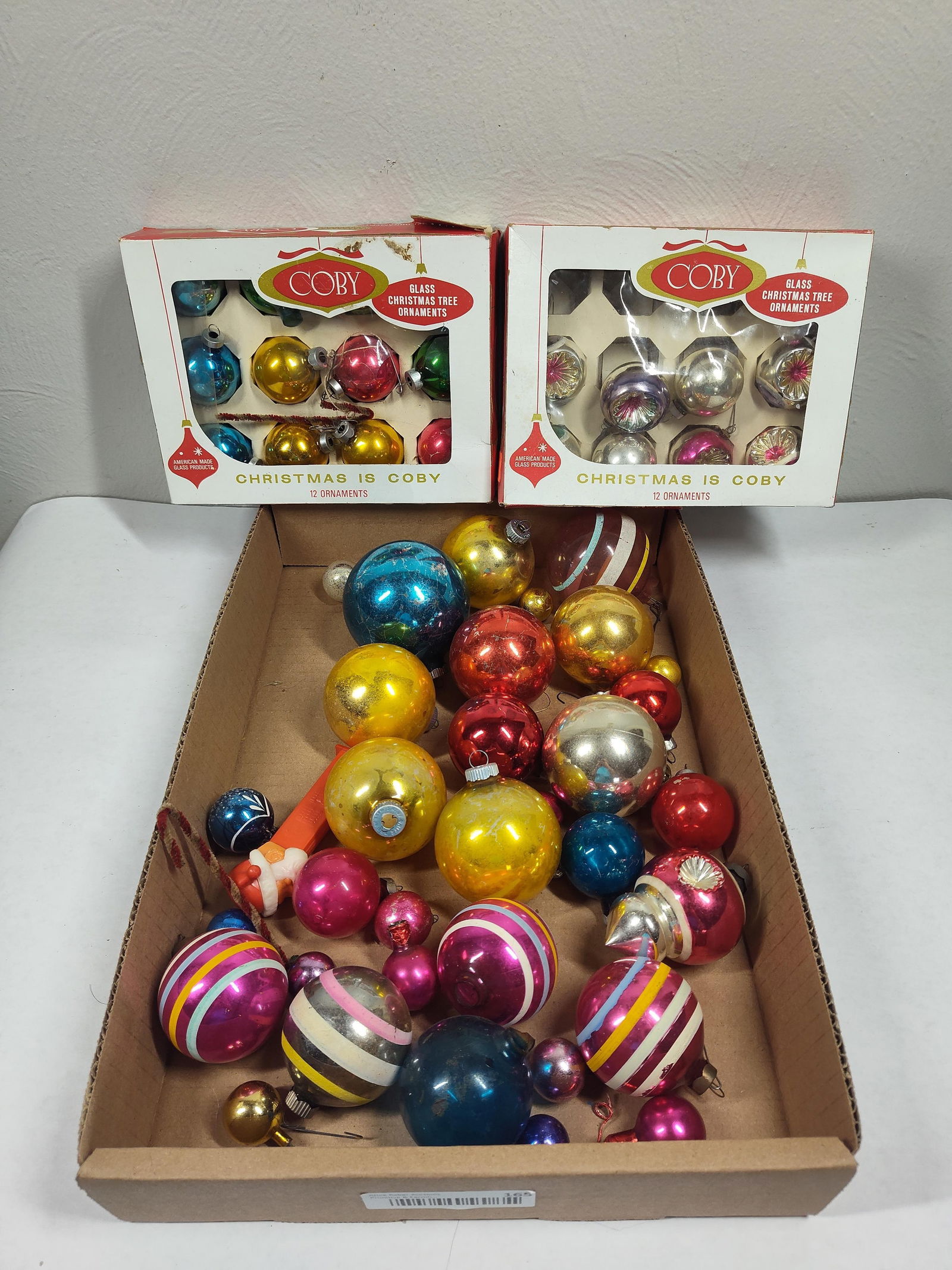 Mercury & Glass Christmas Bulbs & Santa Pez Dispenser: Two partial Coby Ornaments, and many colorful bulbs.