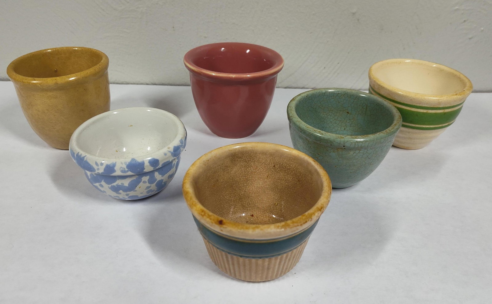 Miniature Crock Bowls: Includes yellow ware Hull and more. Largest is 3.5 inches in diameter x less than 3 inches tall.