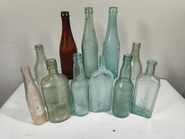 Amber, Clear, and Blue Glass Bottles